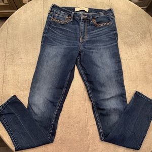HOLLISTER SUPER SKINNY HIGH RISE JEANS WITH LEATHER POCKET DETAIL, 29